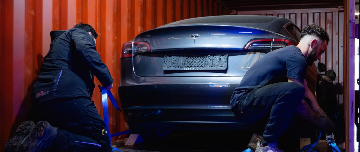 Professional loading of cars into containers